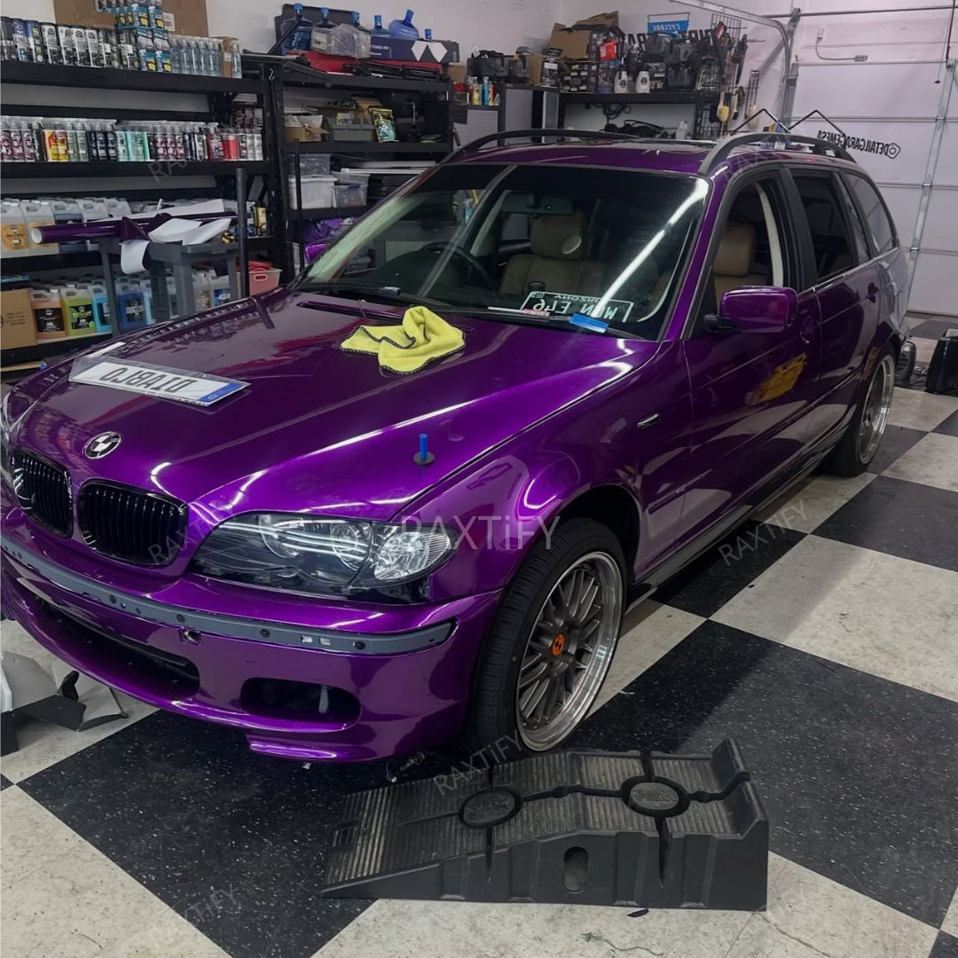 Gloss Metallic Imperial Purple Vinyl Wrap on BMW SUV