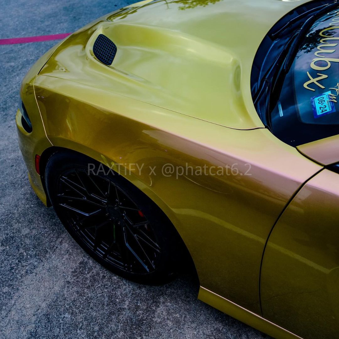 Charger wrapped in Color Shift Lemon Peach Vinyl Wrap