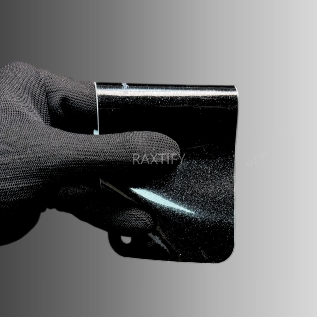 Hand holding a Gloss Metallic Havana Black Car Wrap
