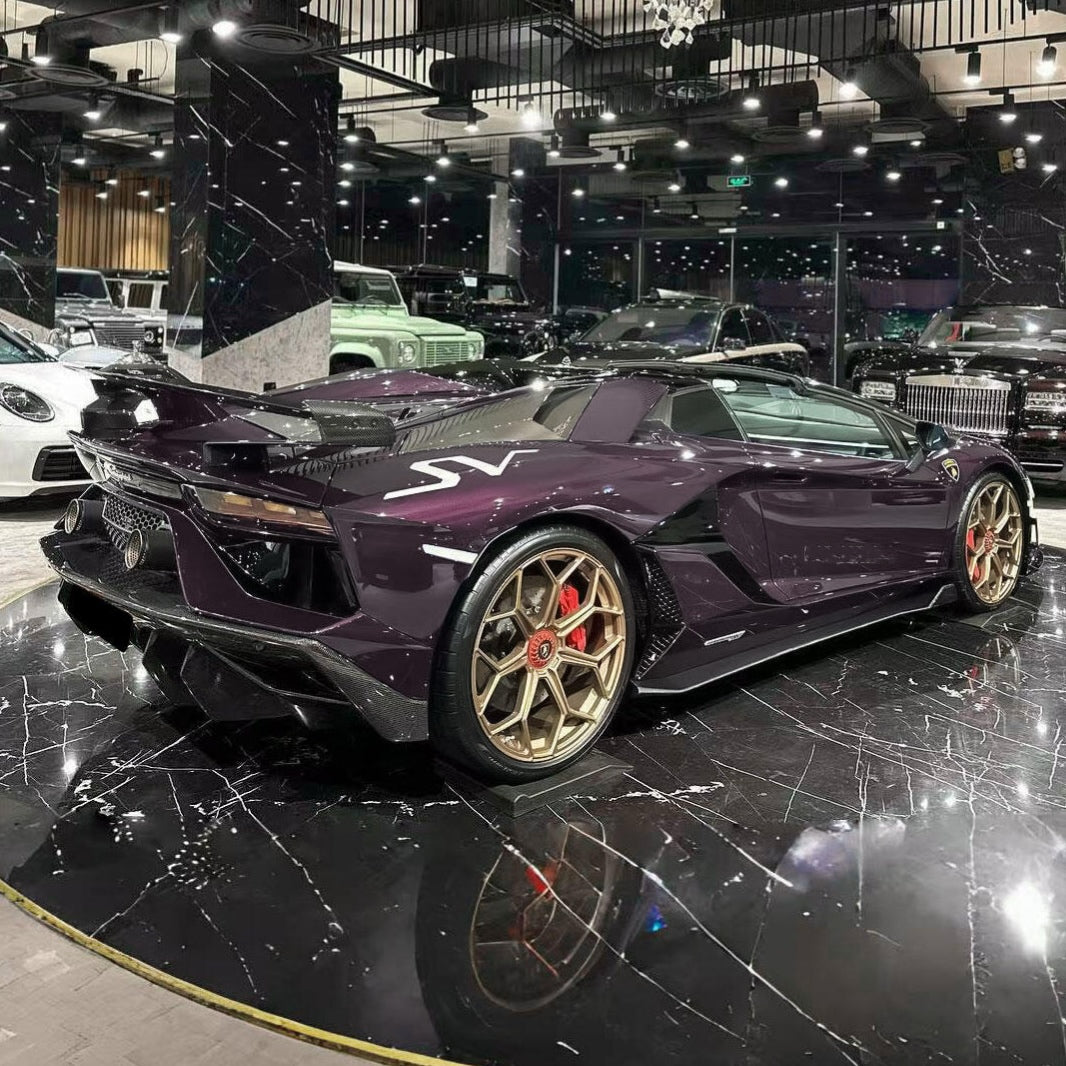 Sport car wrapped in Gloss Metallic Eve Purple Vinyl Wrap