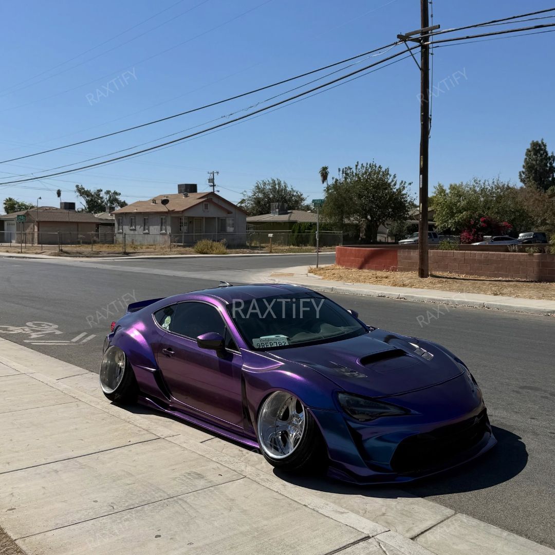 Color Shift Satin Purple Red Vinyl Wrap on subaru outside look
