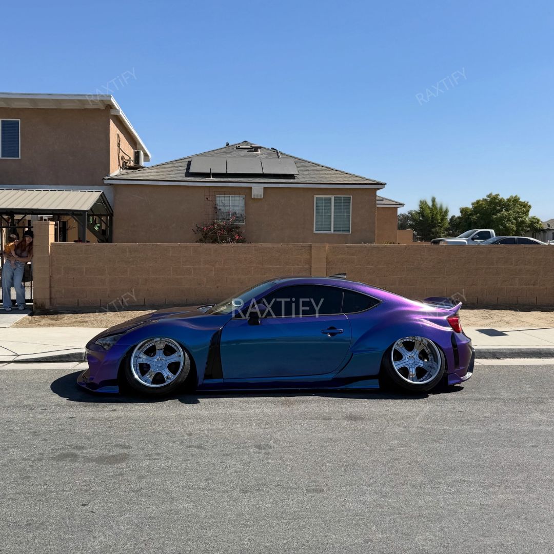 Color Shift Satin Purple Red Vinyl Wrap on subaru side look