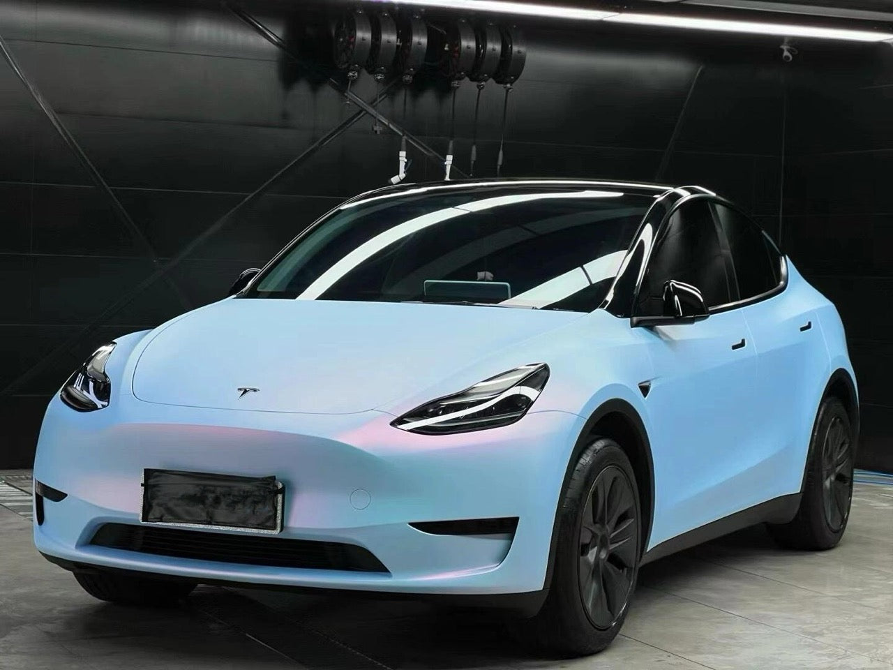 TESLA wrapped in Color Shift Satin Chameleon Blue Vinyl Wrap