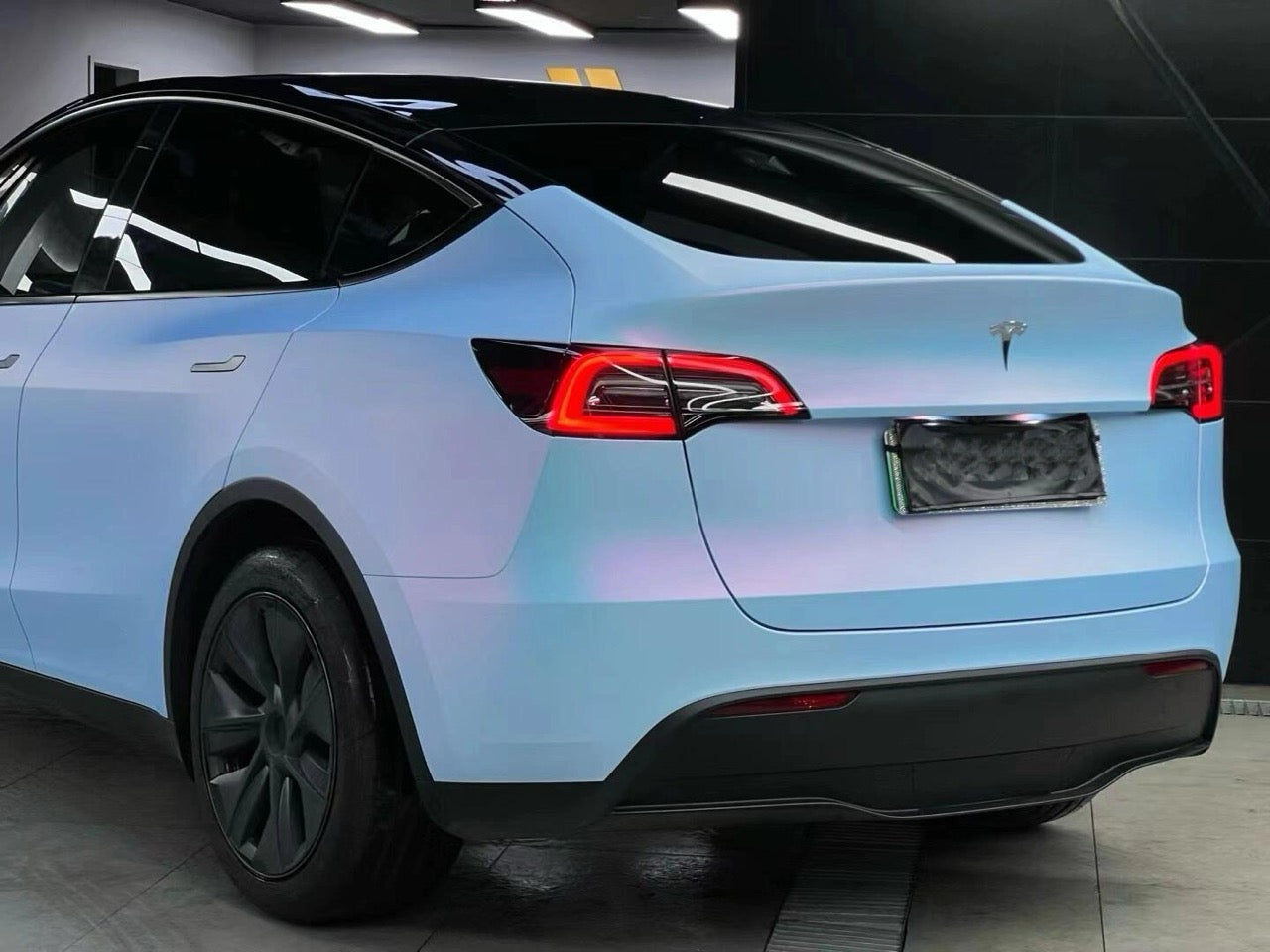 TESLA wrapped in Color Shift Satin Chameleon Blue Vinyl Wrap