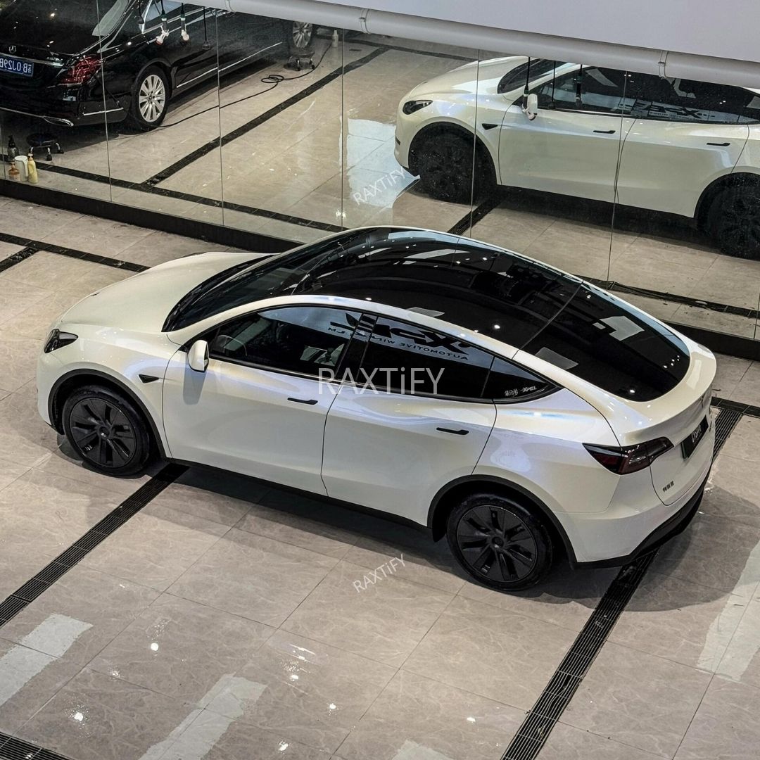 Tesla in Ultra Gloss White Blue Paint Protection Film