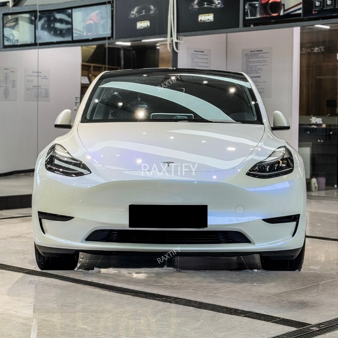 Tesla in Ultra Gloss White Blue Paint Protection Film