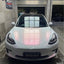 Tesla in Ultra Gloss White Pink Paint Protection Film
