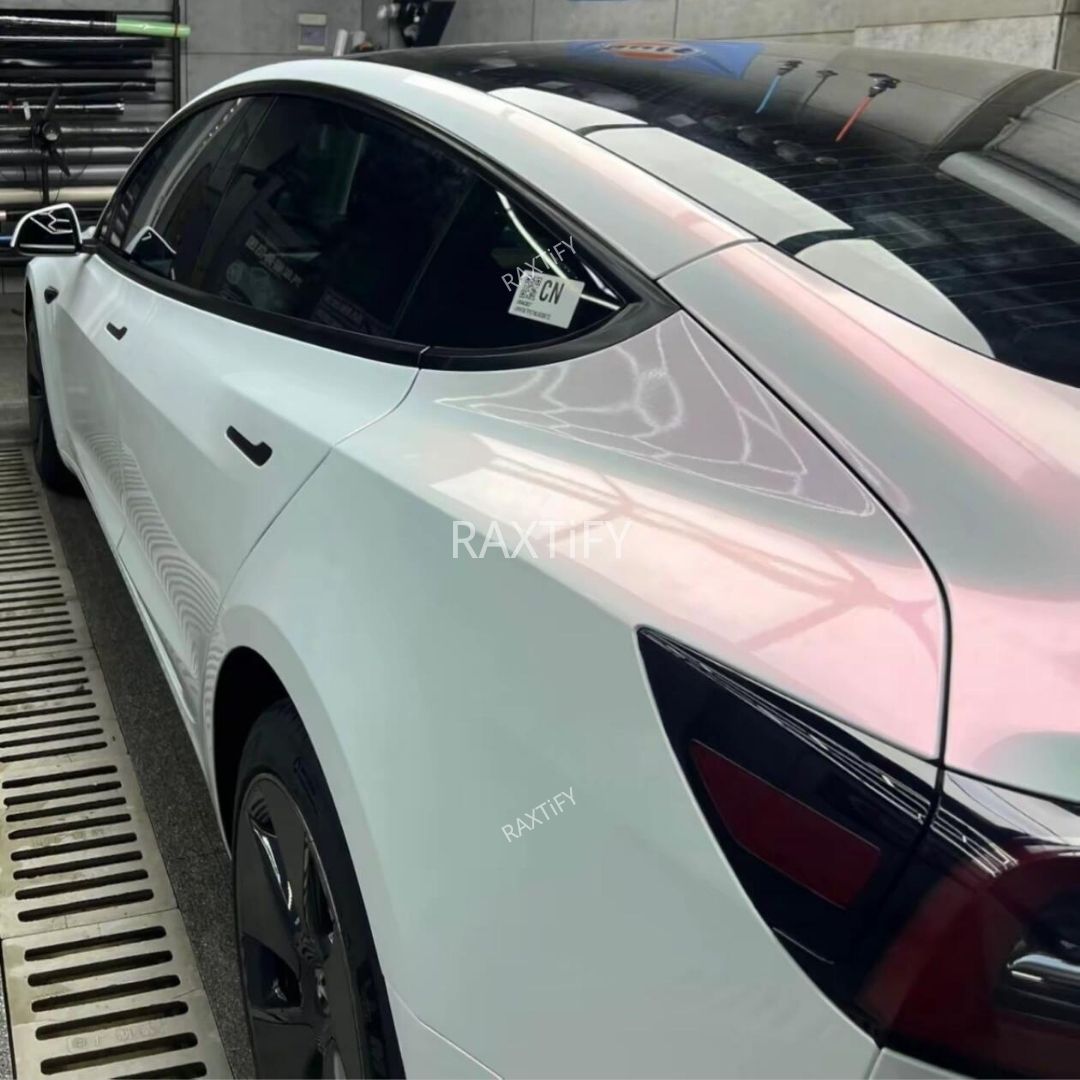 Tesla in Ultra Gloss White Pink Paint Protection Film