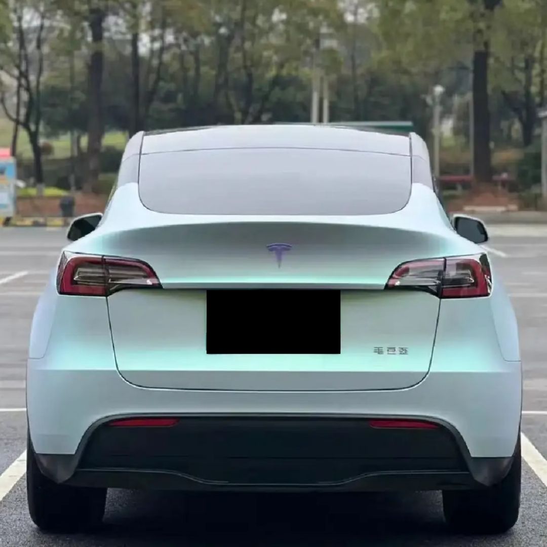 Tesla Wrapped in Ultra Matte Blue Green Vinyl Wrap