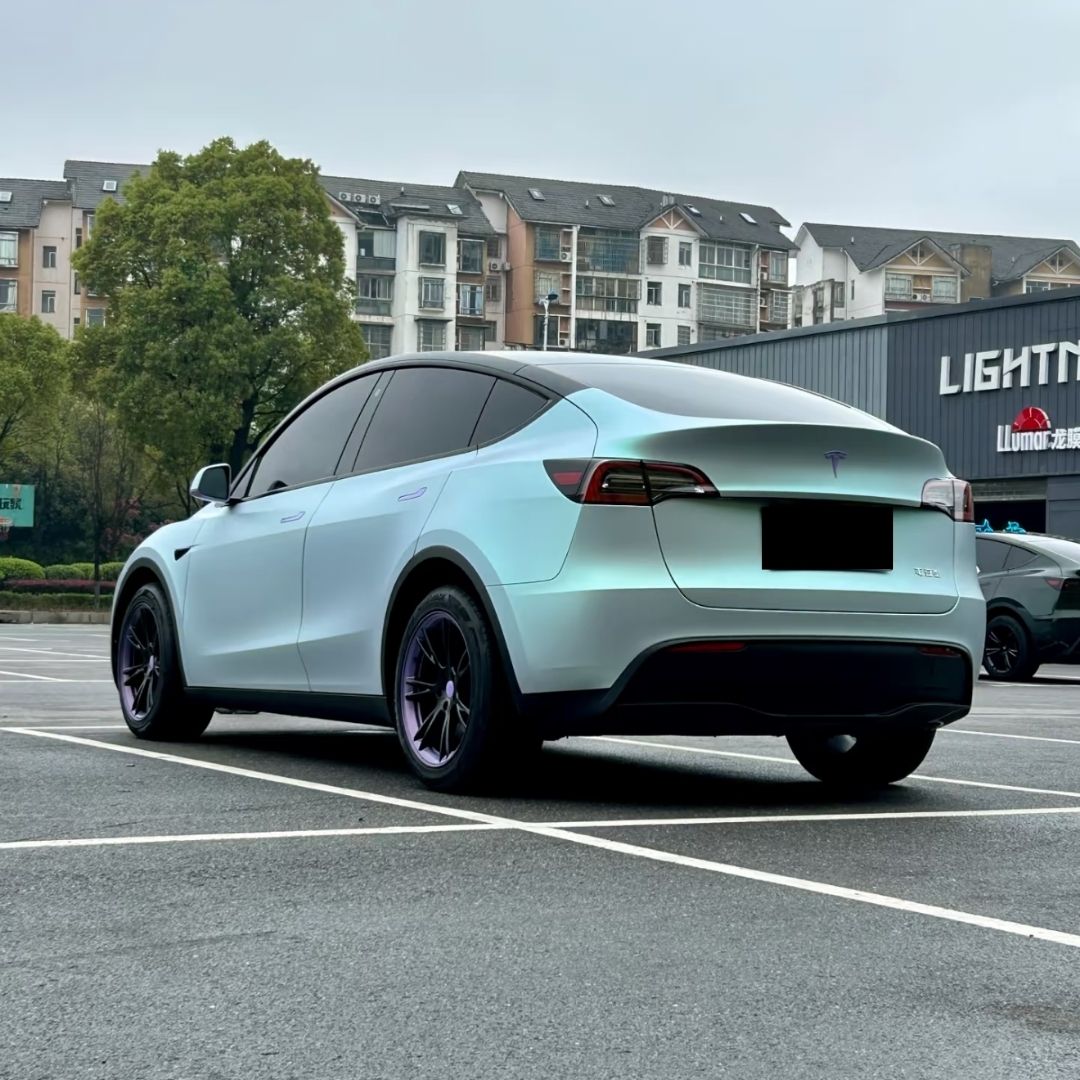 Tesla Wrapped in Ultra Matte Blue Green Vinyl Wrap
