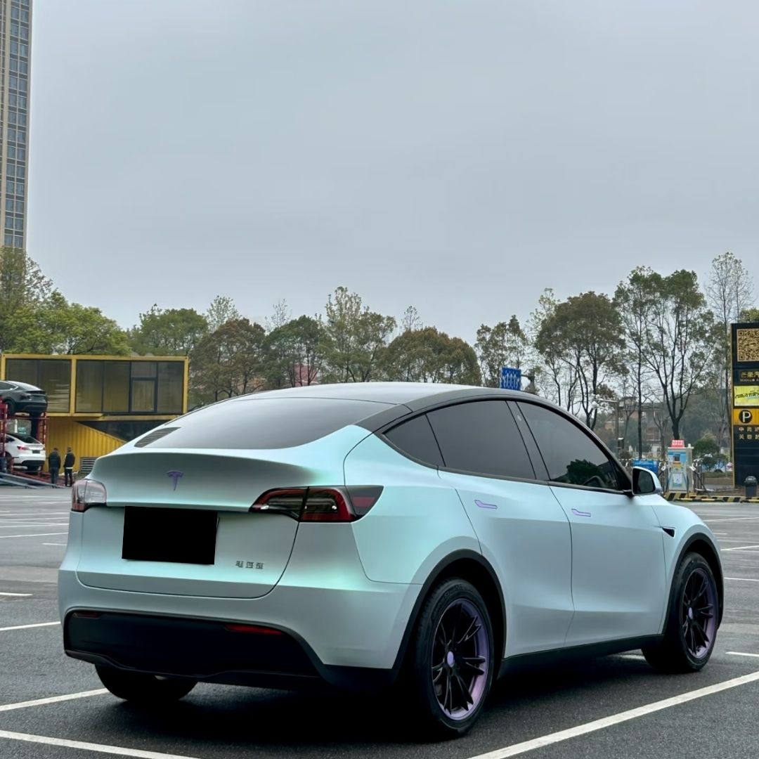 Tesla Wrapped in Ultra Matte Blue Green Vinyl Wrap