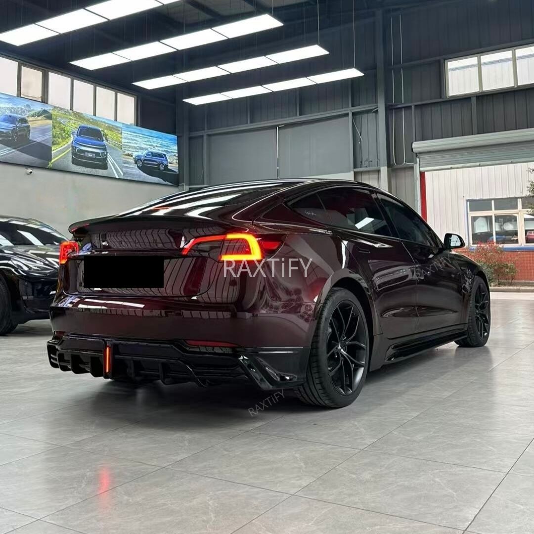 Tesla in Gloss Metallic Burgundy Car Wrap